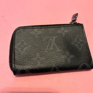 Never used LV coin/card holder. Black and purple hardware is spotless.